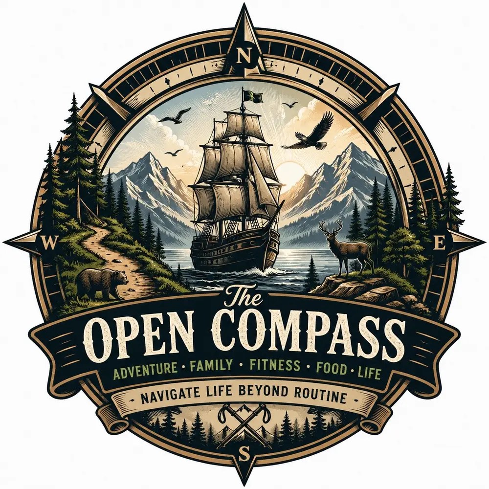 The Open Compass logo featuring a sailing ship, mountains, a bear, and a deer inside a compass