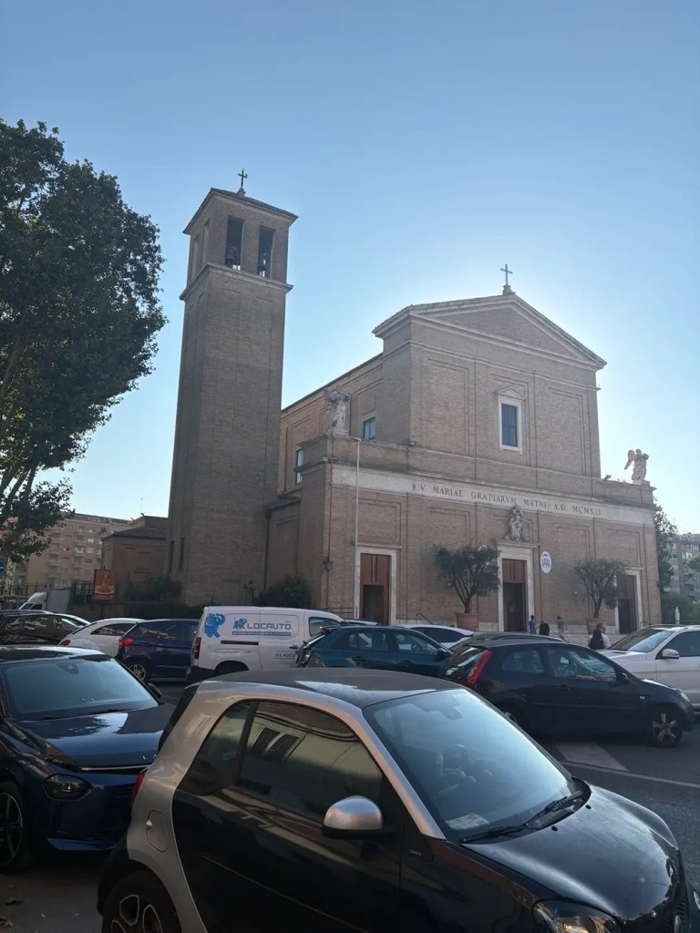 Brick church with a bell tower near Vatican City in Rome