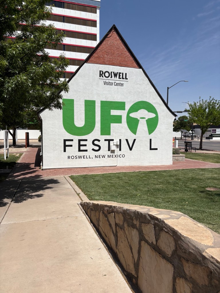 Roswell Visitor Center building with large UFO Festival lettering.